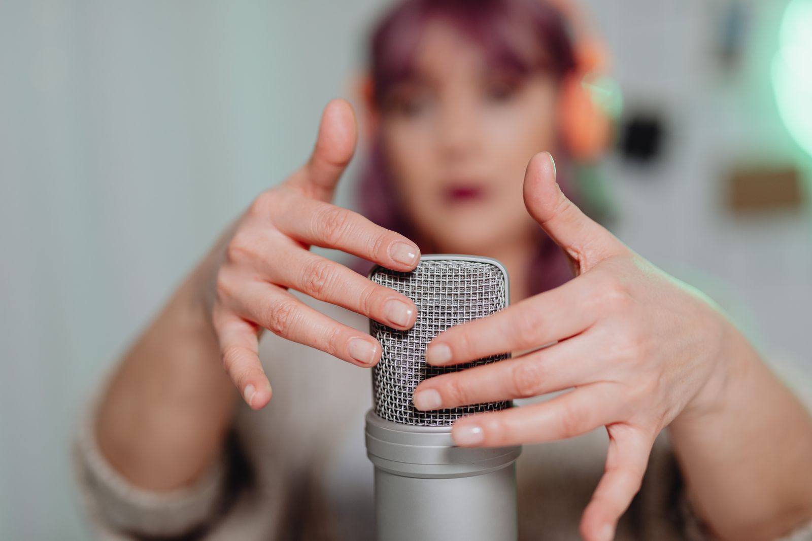 Editor reviewing notes at a recording desk for Loonfeather
